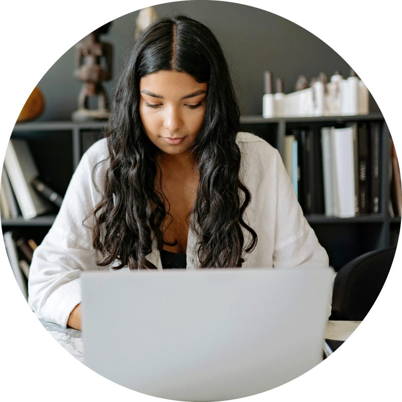 young woman working on laptop